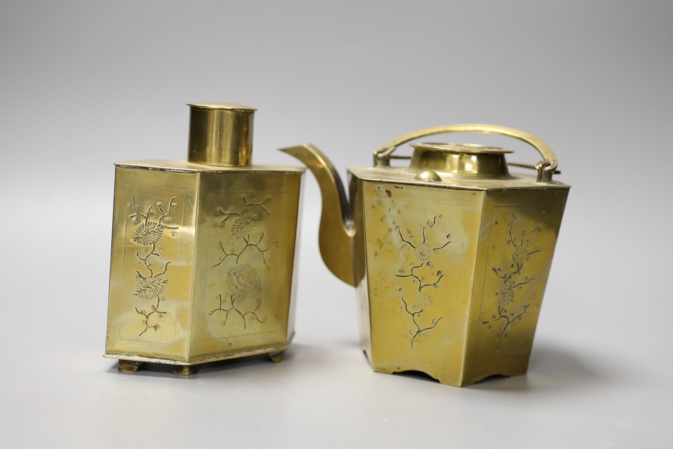 A Chinese brass tea caddy and kettle together with three similar blue and white porcelain bowls, three jars and covers and a Japanese vase